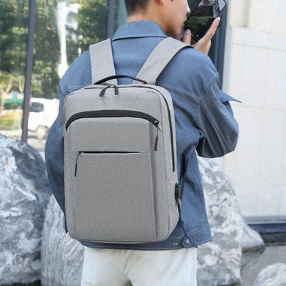 Backpack with Integrated Charging Cable in Grey