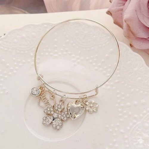 Rhinestone Love Flower Charm Bangle in Silver
