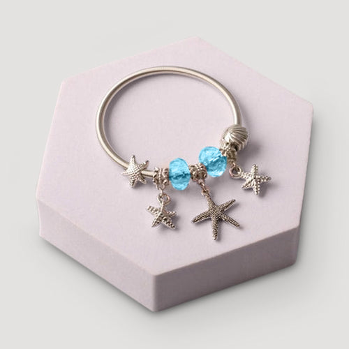 Silver Starfish Crystal Charm Bracelet in Blue