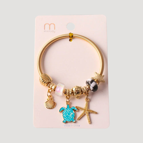 Turtle Starfish Charm Bracelet in Gold
