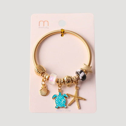 Turtle Starfish Charm Bracelet in Gold