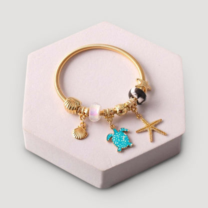 Turtle Starfish Charm Bracelet in Gold