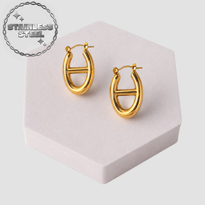 Stainless Steel Divided Oval Huggie Earring in Gold