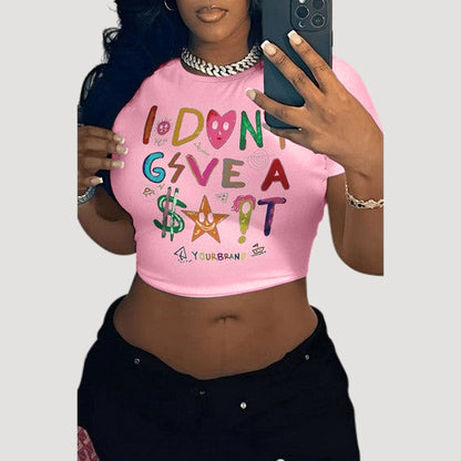 I Don't Give Crop Graphic Tee In Pink